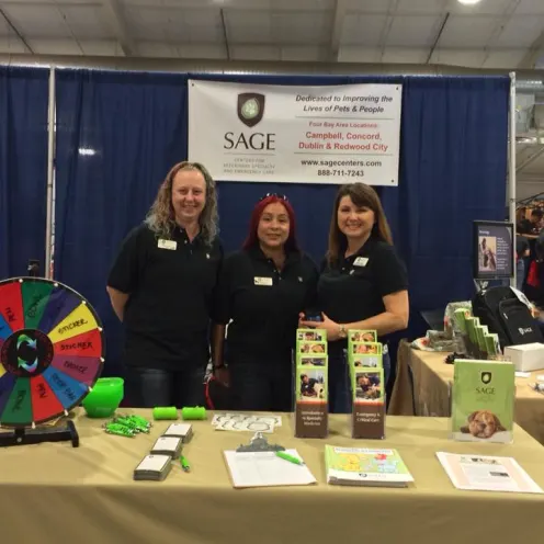 Three SAGE Staff Members at Pet Expo Event